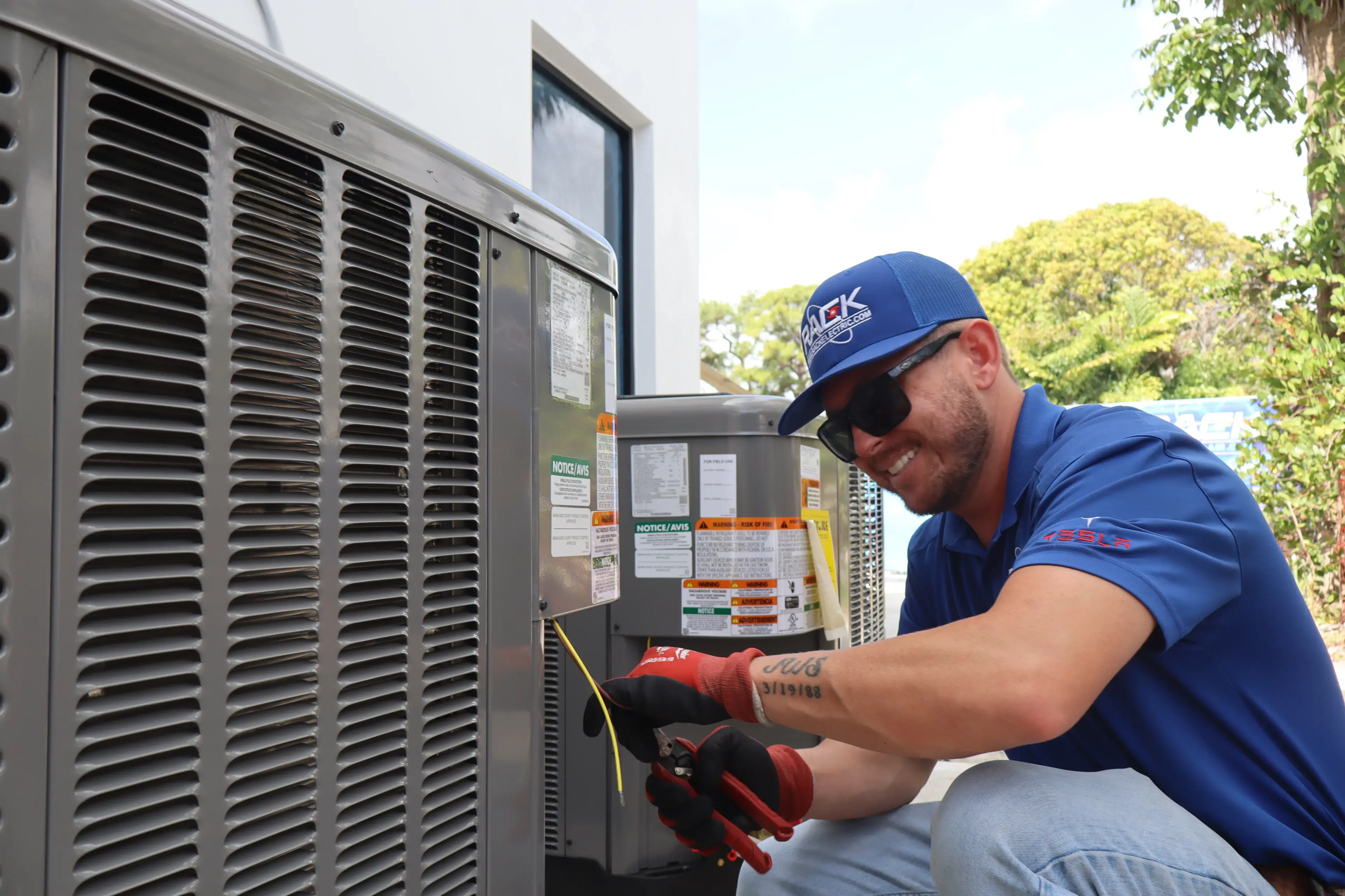 Rack Air tech smiling after completing an AC installation